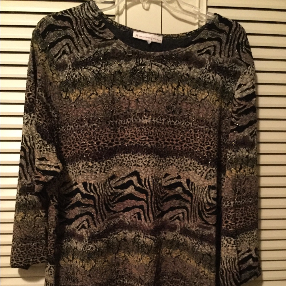 Luxurious animal print top from JM Collection .